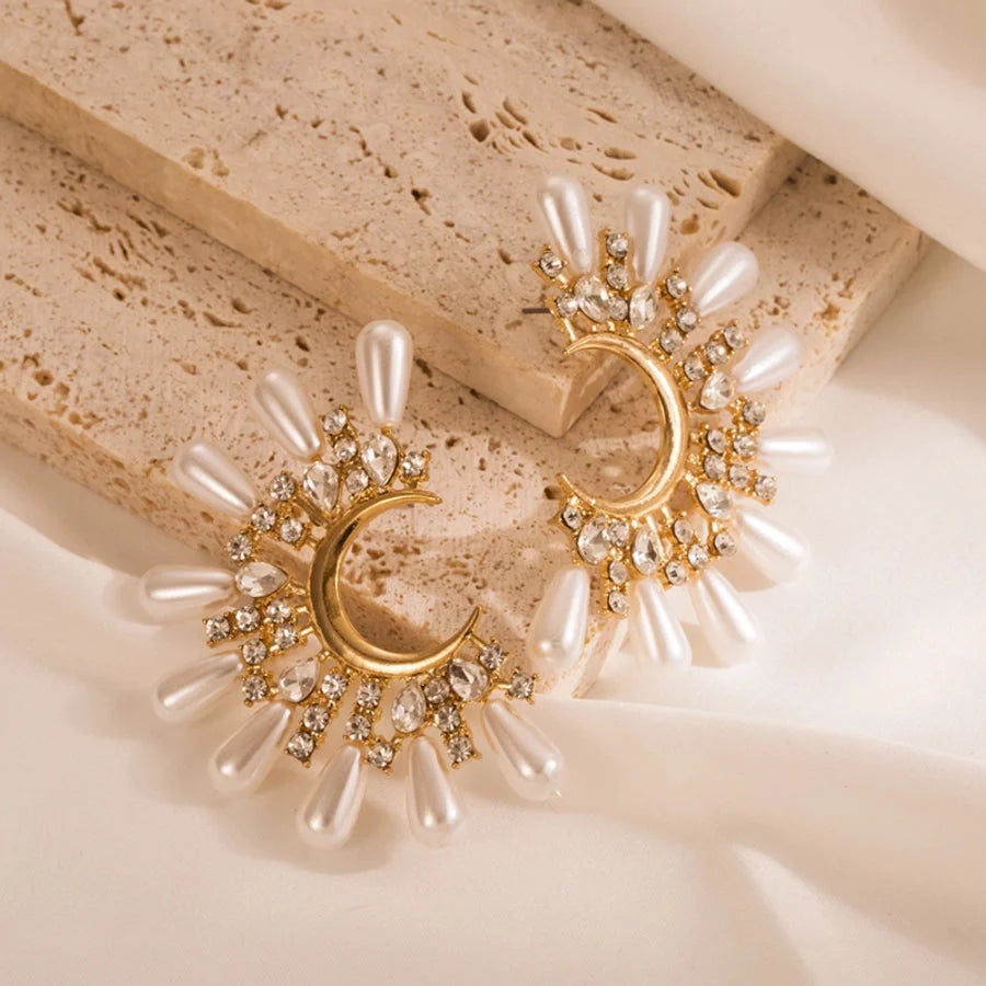 HERMOSA ACCESSORIESS
Crescent Pearl Earrings Artificial Jewellery