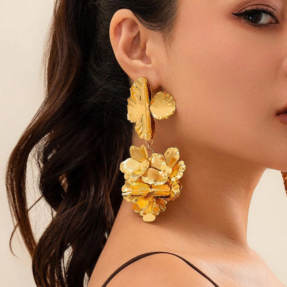 HERMOSA ACCESSORIESS
Crumped Golden Earrings Artificial Jewellery