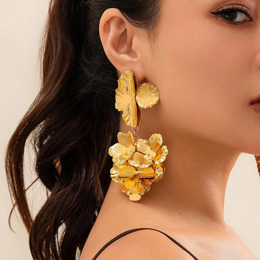 HERMOSA ACCESSORIESS
Crumped Golden Earrings Artificial Jewellery