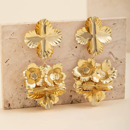 HERMOSA ACCESSORIESS
Crumped Golden Earrings Artificial Jewellery